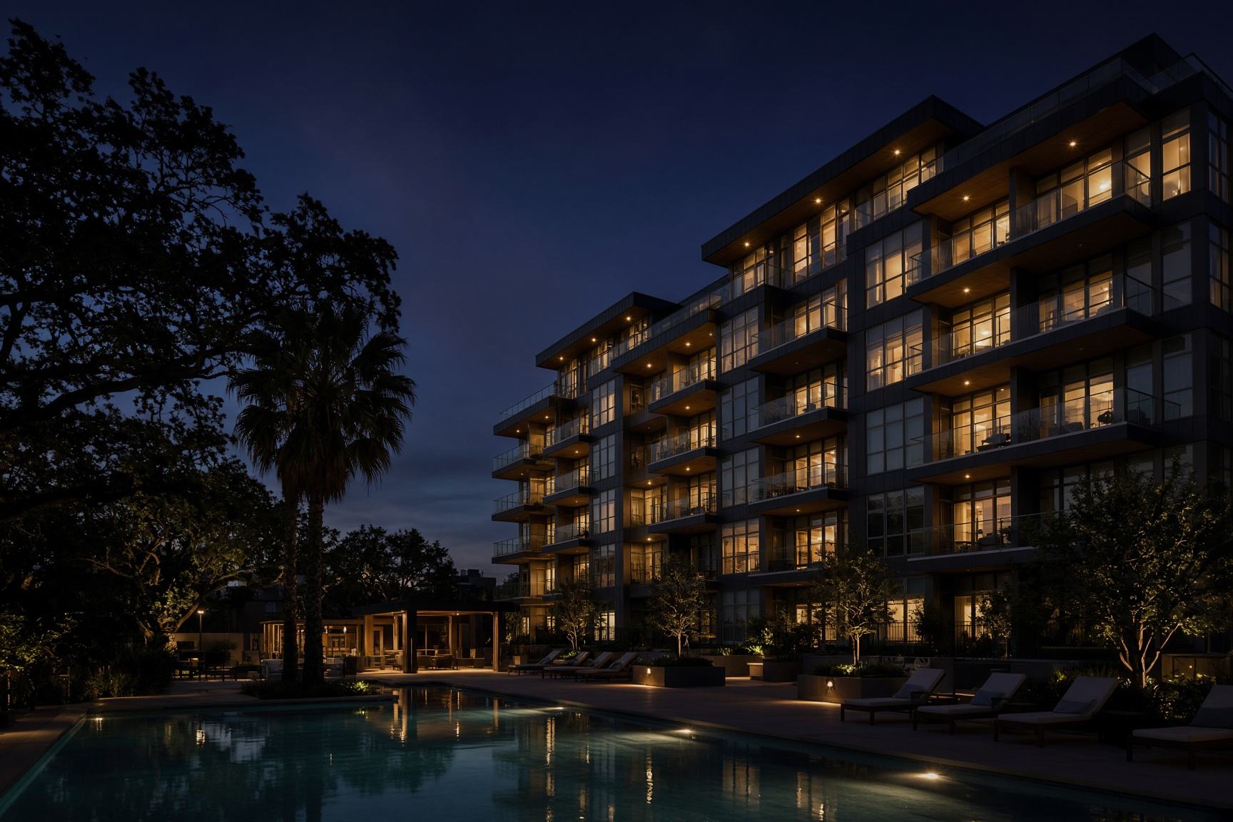 Garden-style multifamily courtyard at blue hour